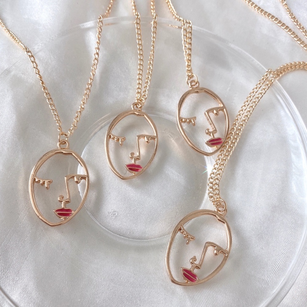 LAST ONE! hollow out face charm necklace (buy 1 get two free!!!)